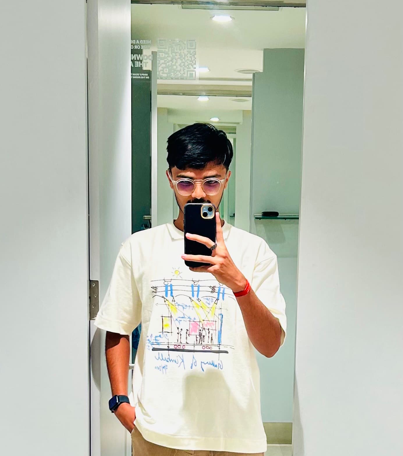 Thilakjo's casual mirror selfie, a clear snapshot of Thilak reflected.